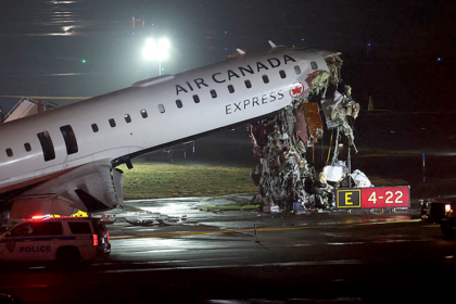 Air Canada jet hits fire truck, killing 2 and forcing New York's LaGuardia airport to close