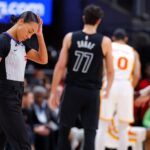 NBA referee goes down hard after brutal collision with camera operator during Hawks-Nets game