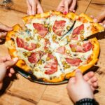 Popular pizza chains face backlash over surging menu prices