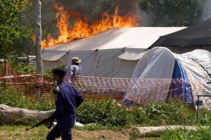 Ebola treatment center set on fire in Congo after residents clash with authorities over victim's body