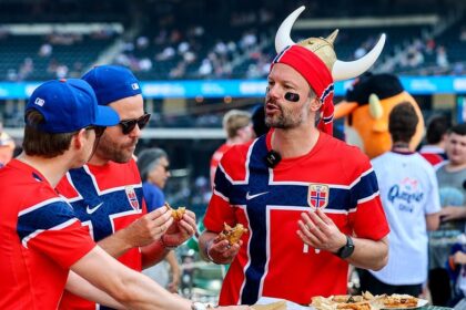 Norwegian World Cup fans turn Citi Field bleachers into a Viking longship during Mets game