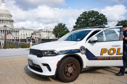 Armed man arrested at US Capitol barricade as police probe why he drove onto restricted grounds