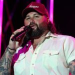Viral video captures Koe Wetzel bringing young fan on stage after spotting issue in the crowd at his concert